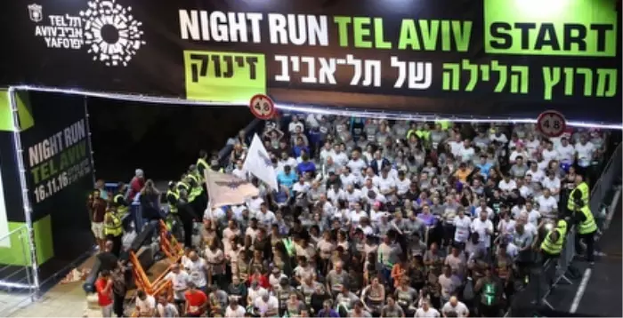 רגע הזינוק במרוץ הלילה של תל אביב (אחמד מוררה)